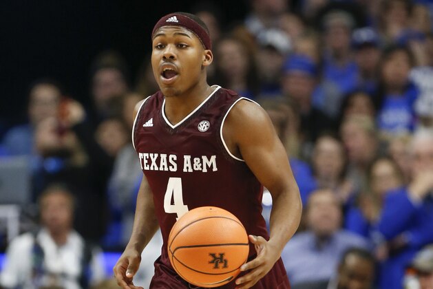 LEXINGTON, KY - JANUARY 09:  JJ Caldwell #4 of the Texas A&M Aggies dribbles with the ball against the Kentucky Wildcats at Rupp Arena on January 9, 2018 in Lexington, Kentucky.  (Photo by Michael Reaves/Getty Images)