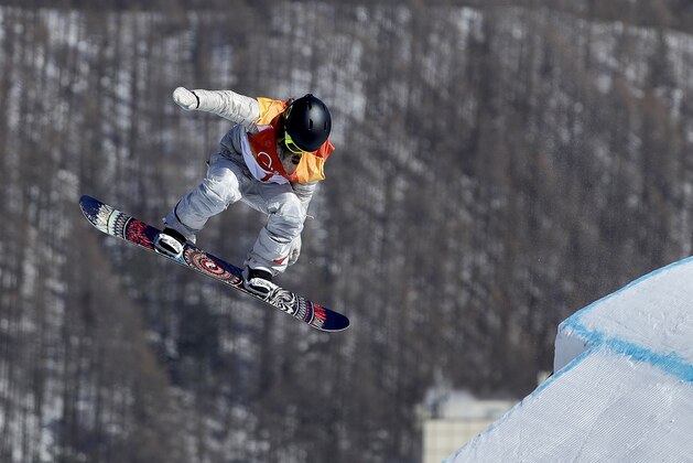 Jamie Anderson, of the United States, jumps during the women's slopestyle final at Phoenix Snow Park at the 2018 Winter Olympics in Pyeongchang, South Korea, Monday, Feb. 12, 2018. (AP Photo/Gregory Bull)