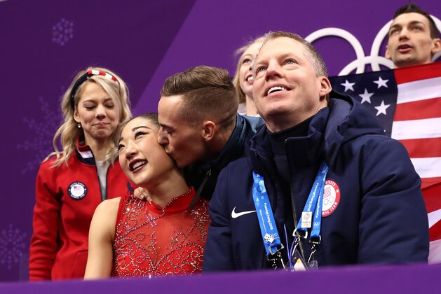 GANGNEUNG, SOUTH KOREA - FEBRUARY 12: Mirai Nagasu of the United States is kissed on the cheek by teammate Adam Rippon of the United States after her routine in the Figure Skating Team Event Â LadiesÂ Single Free Skating on day three of the PyeongChang 2018 Winter Olympic Games at Gangneung Ice Arena on February 12, 2018 in Gangneung, South Korea.  (Photo by Richard Heathcote/Getty Images)