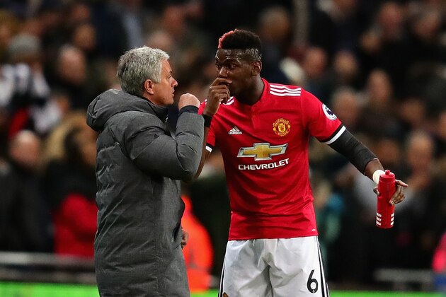 LONDON, ENGLAND - JANUARY 31:  Paul Pogba of Manchester United talks with Jose Mourinho, Manager of Manchester United on the sidelines during the Premier League match between Tottenham Hotspur and Manchester United at Wembley Stadium on January 31, 2018 in London, England.  (Photo by Chris Brunskill Ltd/Getty Images)