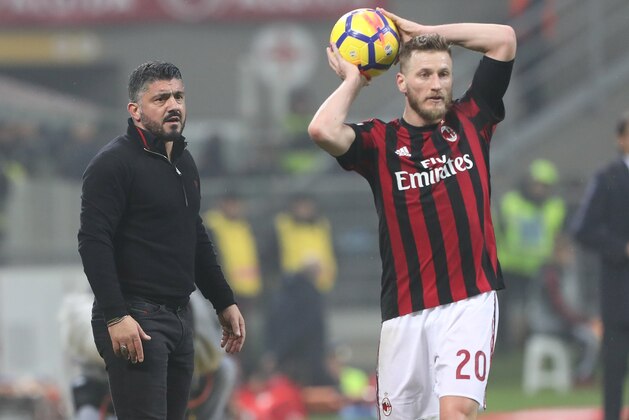 MILAN, ITALY - JANUARY 31:  AC Milan coach Gennaro Gattuso (L) looks on during the TIM Cup match between AC Milan and SS Lazio at Stadio Giuseppe Meazza on January 31, 2018 in Milan, Italy.  (Photo by Marco Luzzani/Getty Images)