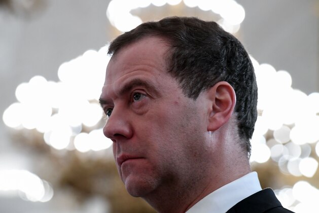 Russian Prime Minister Dmitry Medvedev attends a ceremony to bestow state awards on military personnel who fought in Syria, at the Kremlin in Moscow on December 28, 2017. / AFP PHOTO / POOL / Kirill KUDRYAVTSEV        (Photo credit should read KIRILL KUDRYAVTSEV/AFP/Getty Images)