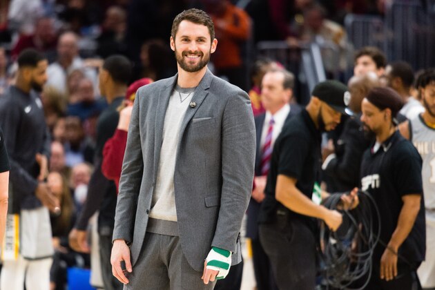 CLEVELAND, OH - FEBRUARY 3: Kevin Love #0 of the Cleveland Cavaliers talks to players on the Houston Rockets bench during a time-out during the second half at Quicken Loans Arena on February 3, 2018 in Cleveland, Ohio. The Rockets defeated the Cavaliers 120-88. NOTE TO USER: User expressly acknowledges and agrees that, by downloading and or using this photograph, User is consenting to the terms and conditions of the Getty Images License Agreement. (Photo by Jason Miller/Getty Images)