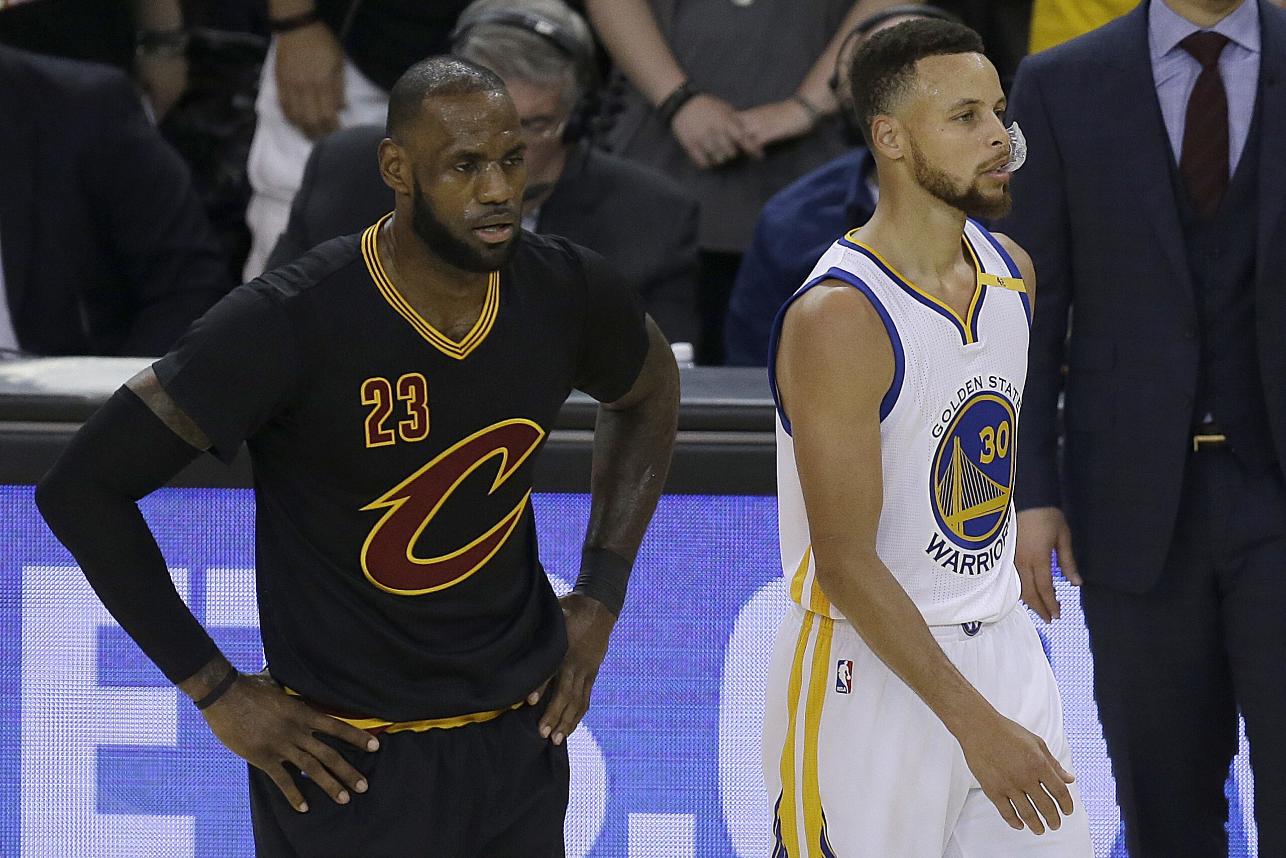 Cleveland Cavaliers forward LeBron James (23) and Golden State Warriors guard Stephen Curry (30) during the first half of Game 5 of basketball's NBA Finals in Oakland, Calif., Monday, June 12, 2017. (AP Photo/Ben Margot)