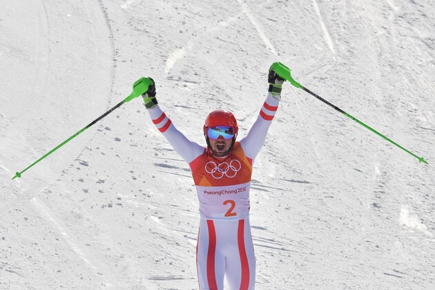 Austria's Marcel Hirscher celebrates after crossing the finish line of the Men's Alpine Combined Slalom at the Jeongseon Alpine Center during the Pyeongchang 2018 Winter Olympic Games in Pyeongchang on February 13, 2018.  / AFP PHOTO / Dimitar DILKOFF        (Photo credit should read DIMITAR DILKOFF/AFP/Getty Images)