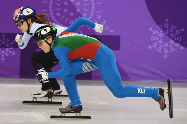 Italy's Arianna Fontana and South Korea's Choi Minjeong compete in the women's 500m short track speed skating semi-final event during the Pyeongchang 2018 Winter Olympic Games, at the Gangneung Ice Arena in Gangneung on February 13, 2018. / AFP PHOTO / Roberto SCHMIDT        (Photo credit should read ROBERTO SCHMIDT/AFP/Getty Images)