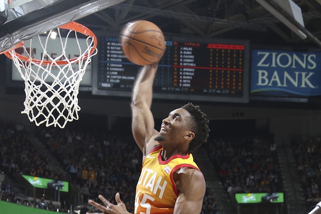 SALT LAKE CITY, UT - FEBRUARY 9: Donovan Mitchell #45 of the Utah Jazz dunks the ball against the Charlotte Hornets on February 9, 2018 at Vivint Smart Home Arena in Salt Lake City, Utah. NOTE TO USER: User expressly acknowledges and agrees that, by downloading and or using this Photograph, User is consenting to the terms and conditions of the Getty Images License Agreement. Mandatory Copyright Notice: Copyright 2018 NBAE (Photo by Melissa Majchrzak/NBAE via Getty Images)