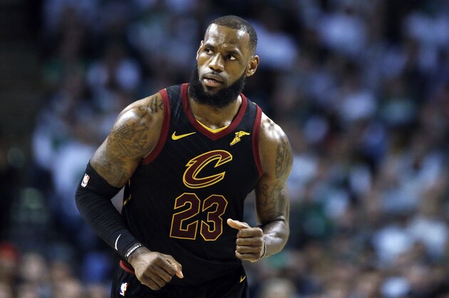 Cleveland Cavaliers' LeBron James plays against the Boston Celtics during the second quarter of an NBA basketball game in Boston, Sunday, Feb. 11, 2018. (AP Photo/Michael Dwyer)
