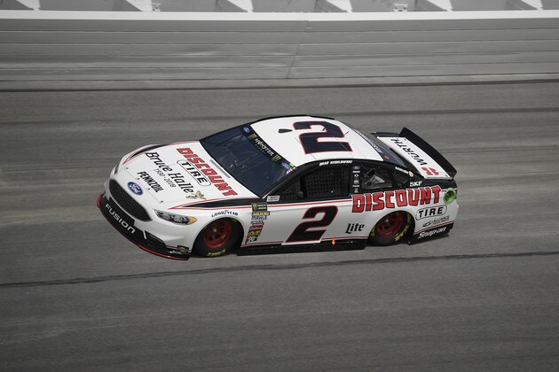 Brad Keselowski (2) makes his way through Turn 4 during qualifying for the Daytona 500 auto race at the Daytona International Speedway Sunday, Feb. 11, 2018, in Daytona Beach, Fla. (AP Photo/Phelan M. Ebenhack)