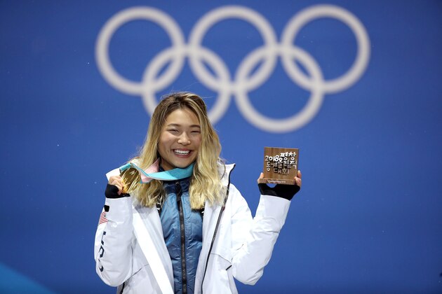 PYEONGCHANG-GUN, SOUTH KOREA - FEBRUARY 13:  Gold medalist Chloe Kim of the United States poses during the medal ceremony for the Snowboard Ladies' Halfpipe Final on day four of the PyeongChang 2018 Winter Olympic Games at Medal Plaza on February 13, 2018 in Pyeongchang-gun, South Korea.  (Photo by Sean M. Haffey/Getty Images)