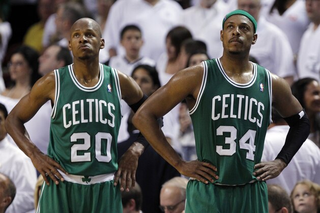 Boston Celtics' Ray Allen (20) and Paul Pierce (34) look up at the scoreboard as the Celtics fall behind the Miami Heat during the second half of Game 7 of the NBA basketball playoffs Eastern Conference finals, Saturday, June 9, 2012, in Miami. Miami won 101-88. (AP Photo/Lynne Sladky)