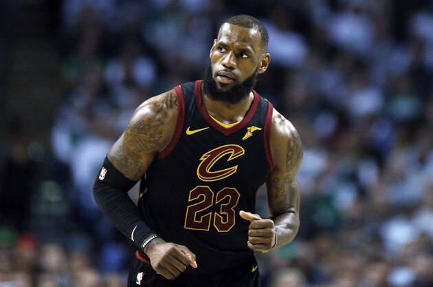 Cleveland Cavaliers' LeBron James plays against the Boston Celtics during the second quarter of an NBA basketball game in Boston, Sunday, Feb. 11, 2018. (AP Photo/Michael Dwyer)