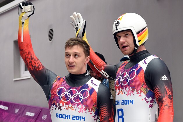 Germany's Sascha Benecken and Toni Eggert celebrate the end of their Luge Doubles Run 2 at the Sanki Sliding Center during the Sochi Winter Olympics on February 12, 2014. AFP PHOTO / LEON NEAL (Photo credit should read LEON NEAL/AFP/Getty Images) Germany's Sascha Benecken and Toni Eggert celebrate the end of their Luge Doubles Run 2 at the Sanki Sliding Center during the Sochi Winter Olympics on February 12, 2014. AFP PHOTO / LEON NEAL (Photo credit should read LEON NEAL/AFP/Getty Images)