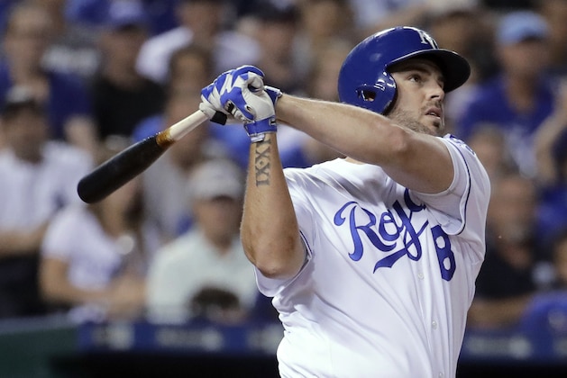 Kansas City Royals' Mike Moustakas watches his three-run home run during the fifth inning of the team's baseball game against the New York Yankees on Thursday, May 18, 2017, in Kansas City, Mo. (AP Photo/Charlie Riedel)