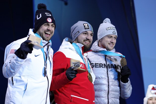 PYEONGCHANG-GUN, SOUTH KOREA - FEBRUARY 12:  (L-R) Silver medalist Chris Mazdzer of the United States, gold medalist David Gleirscher of Austria and bronze medalist Johannes Ludwig of Germany pose during the medal ceremony for the Luge Men's Singles at Medal Plaza on February 12, 2018 in Pyeongchang-gun, South Korea.  (Photo by Andreas Rentz/Getty Images)