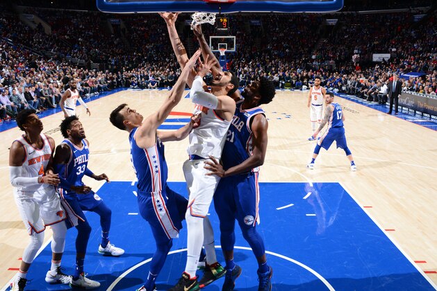 PHILADELPHIA,PA - FEBRUARY 12 : Enes Kanter #00 of the New York Knicks goes up for the layup against the Philadelphia 76ers at Wells Fargo Center on February 12, 2018 in Philadelphia, Pennsylvania NOTE TO USER: User expressly acknowledges and agrees that, by downloading and/or using this Photograph, user is consenting to the terms and conditions of the Getty Images License Agreement. Mandatory Copyright Notice: Copyright 2018 NBAE (Photo by Jesse D. Garrabrant/NBAE via Getty Images)