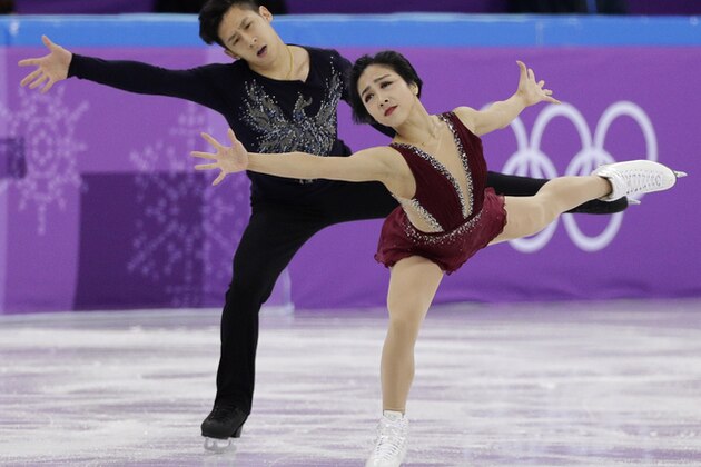 Sui Wenjing and Han Cong of China perform in the pair figure skating short program in the Gangneung Ice Arena at the 2018 Winter Olympics in Gangneung, South Korea, Wednesday, Feb. 14, 2018. (AP Photo/David J. Phillip)