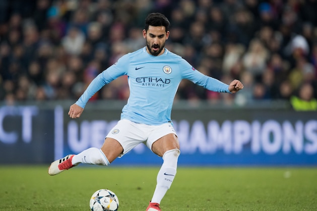 BASEL, SWITZERLAND - FEBRUARY 13: Ilkay Gundogan of Manchester City controls the ball during the UEFA Champions League Round of 16 First Leg match between FC Basel and Manchester City at St. Jakob-Park on February 13, 2018 in Basel, Switzerland. (Photo by Simon Hofmann/Getty Images)