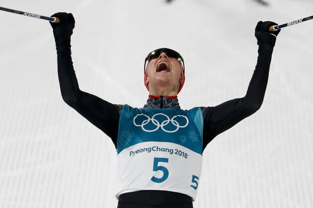 Eric Frenzel, of Germany, celebrates after winning the the gold medal after the 10km cross-country skiing portion of the nordic combined event at the 2018 Winter Olympics in Pyeongchang, South Korea, Wednesday, Feb. 14, 2018. (AP Photo/Matthias Schrader)