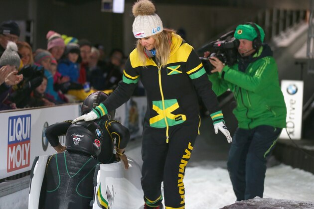 KOENIGSSEE, GERMANY - JANUARY 20: Sandra Kiriasis  (C), head coach of team Jamaica reacts with her athletes Jazmine Fenlator-Victorian and Carrie Russell of Jamaica at Deutsche Post Eisarena Koenigssee after the BMW IBSF World Cup Women`s Bobsleigh World Cup on January 19, 2018 in Koenigssee, Germany.  (Photo by Alexander Hassenstein/Getty Images For IBSF)