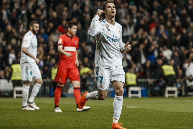 MADRID, SPAIN - FEBRUARY 10: Cristiano Ronaldo of Real Madrid celebrates after scoring a goal during the La Liga match between Real Madrid and Real Sociedad at Estadio Santiago Bernabeu on February 10, 2018 in Madrid, Spain. (Photo by TF-Images/TF-Images via Getty Images) MADRID, SPAIN - FEBRUARY 10: Cristiano Ronaldo of Real Madrid celebrates after scoring a goal during the La Liga match between Real Madrid and Real Sociedad at Estadio Santiago Bernabeu on February 10, 2018 in Madrid, Spain. (Photo by TF-Images/TF-Images via Getty Images)
