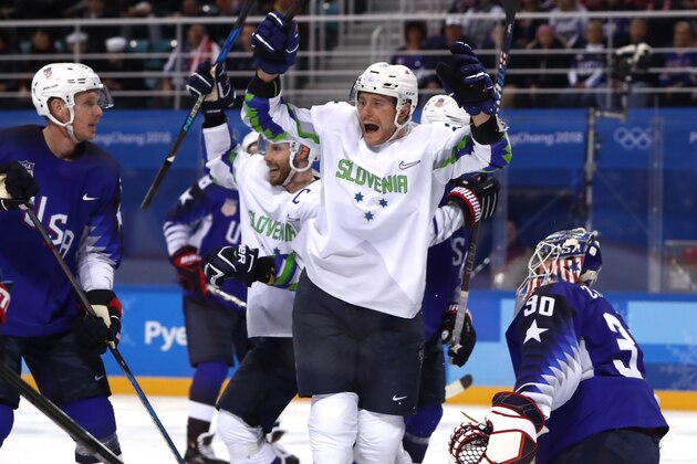 GANGNEUNG, SOUTH KOREA - FEBRUARY 14:  Jan Urbas #26 of Slovenia celebrates a goal scored by Blaz Gregorc #15 against Ryan Zapolski #30 of the United States in the third period during the Men's Ice Hockey Preliminary Round Group B game on day five of the PyeongChang 2018 Winter Olympics at Kwandong Hockey Centre on February 14, 2018 in Gangneung, South Korea.  (Photo by Ronald Martinez/Getty Images)