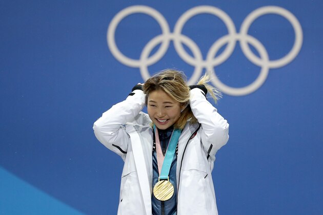 PYEONGCHANG-GUN, SOUTH KOREA - FEBRUARY 13:  Gold medalist Chloe Kim of the United States poses during the medal ceremony for the Snowboard Ladies' Halfpipe Final on day four of the PyeongChang 2018 Winter Olympic Games at Medal Plaza on February 13, 2018 in Pyeongchang-gun, South Korea.  (Photo by Sean M. Haffey/Getty Images)