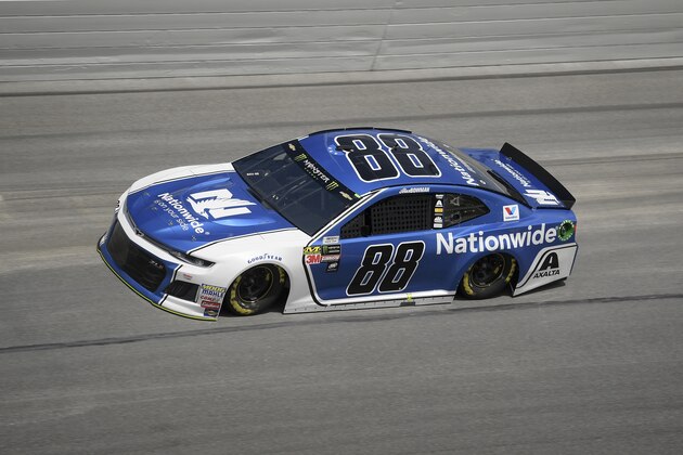 Alex Bowman (88) makes his way through Turn 4 during qualifying for the Daytona 500 auto race at the Daytona International Speedway Sunday, Feb. 11, 2018, in Daytona Beach, Fla. (AP Photo/Phelan M. Ebenhack)