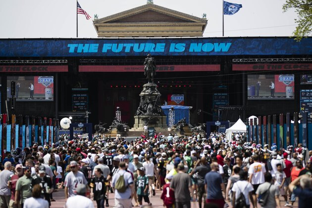 Fans gather for the 2017 NFL football draft, Saturday, April 29, 2017, on the steps of the Philadelphia Museum of Art in Philadelphia. (AP Photo/Matt Rourke)