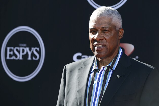 FILE - In this July 16, 2014 file photo, NBA legend Julius Erving arrives at the ESPY Awards at the Nokia Theatre in Los Angeles. Erving fell ill at the Philadelphia 76ers' game Friday, Jan. 5, 2018 and was taken to a hospital. There was no immediate update on his condition. (Photo by Jordan Strauss/Invision/AP, File)