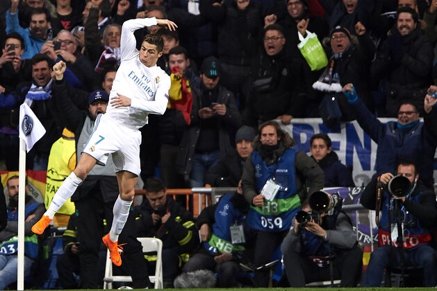 MADRID, SPAIN - FEBRUARY 14:  Cristiano Ronaldo of Real Madrid celebrates after scoring his sides second goal during the UEFA Champions League Round of 16 First Leg match between Real Madrid and Paris Saint-Germain at Bernabeu on February 14, 2018 in Madrid, Spain.  (Photo by Manuel Queimadelos Alonso/Getty Images)