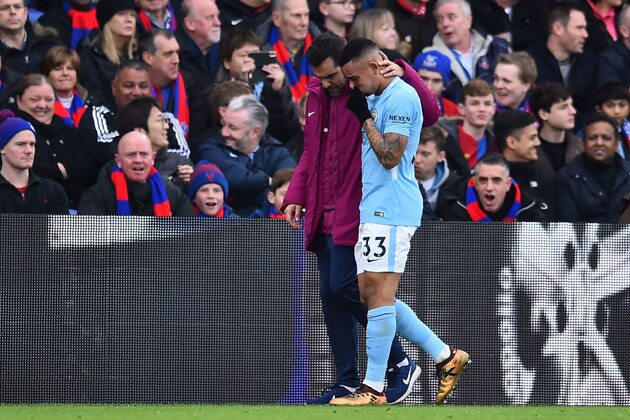 Manchester City's Brazilian striker Gabriel Jesus is consoled as he leaves the game after picking up an injury during the English Premier League football match between Crystal Palace and Manchester City at Selhurst Park in south London on December 31, 2017. / AFP PHOTO / Glyn KIRK / RESTRICTED TO EDITORIAL USE. No use with unauthorized audio, video, data, fixture lists, club/league logos or 'live' services. Online in-match use limited to 75 images, no video emulation. No use in betting, games or single club/league/player publications.  /         (Photo credit should read GLYN KIRK/AFP/Getty Images)