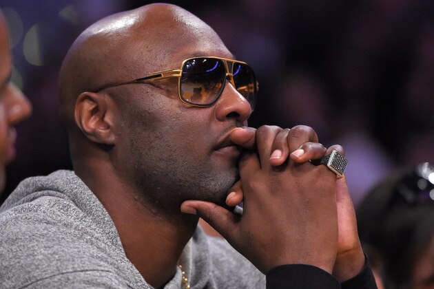 Former Los Angeles Lakers' Lamar Odom watches during the second half of an NBA basketball game between the Lakers and the Miami Heat, Wednesday, March 30, 2016, in Los Angeles. The Lakers won 102-100 in overtime. (AP Photo/Mark J. Terrill) Former Los Angeles Lakers' Lamar Odom watches during the second half of an NBA basketball game between the Lakers and the Miami Heat, Wednesday, March 30, 2016, in Los Angeles. The Lakers won 102-100 in overtime. (AP Photo/Mark J. Terrill)