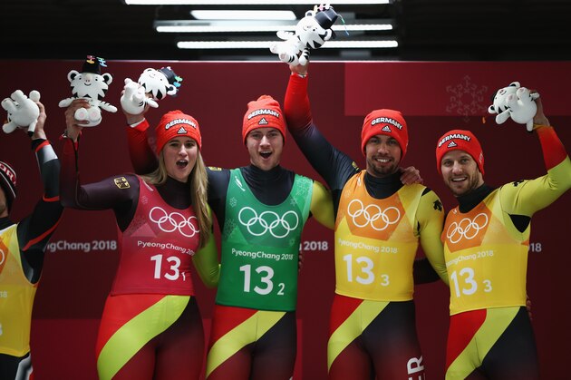 PYEONGCHANG-GUN, SOUTH KOREA - FEBRUARY 15:  Natalie Geisenberger, Johannes Ludwig, Tobias Wendl and Tobias Arlt of Germany celebrate winning gold in the Luge Team Relay on day six of the PyeongChang 2018 Winter Olympic Games at Olympic Sliding Centre on February 15, 2018 in Pyeongchang-gun, South Korea.  (Photo by Dan Istitene/Getty Images)