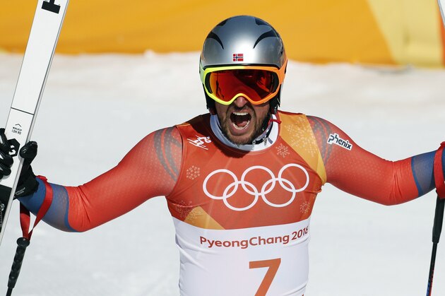 Norway's Aksel Lund Svindal reacts in the finish area of the men's downhill at the 2018 Winter Olympics in Jeongseon, South Korea, Thursday, Feb. 15, 2018. (AP Photo/Christophe Ena)