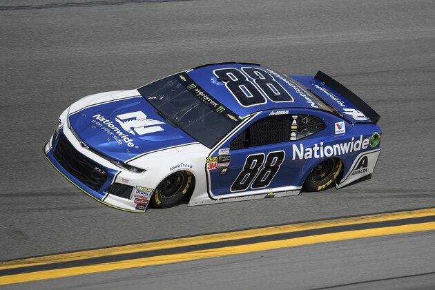 Alex Bowman (88) drives through Turn 4 of the Daytona International Speedway during qualifying for the Daytona 500 auto race Sunday, Feb. 11, 2018, in Daytona Beach, Fla. (AP Photo/Phelan M. Ebenhack)