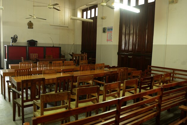A High Court room is empty as Sri Lankan lawyers stayed away from work during a protest in Colombo on December 12, 2012. Lawyers staged the token one-day protest to denounce government moves to impeach Chief Justice Shriani Bandaranayake after she scuttled several bills that would have given more powers to the ruling party. AFP PHOTO/ Ishara S.KODIKARA        (Photo credit should read Ishara S.KODIKARA/AFP/Getty Images)