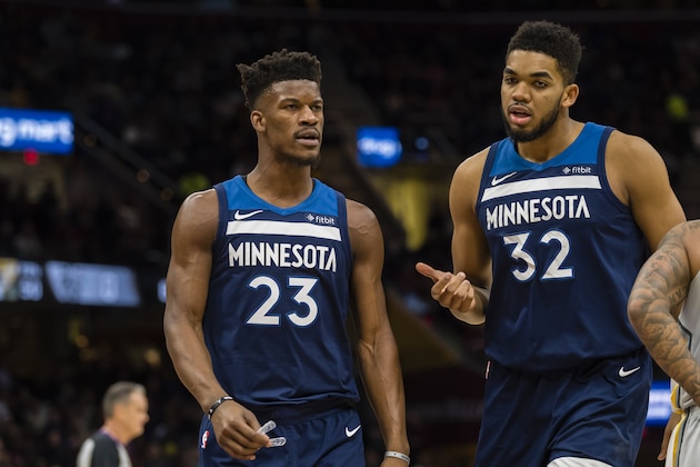 CLEVELAND, OH - FEBRUARY 7: Jimmy Butler #23 talks with Karl-Anthony Towns #32 of the Minnesota Timberwolves during the first half against the Cleveland Cavaliers at Quicken Loans Arena on February 7, 2018 in Cleveland, Ohio. NOTE TO USER: User expressly acknowledges and agrees that, by downloading and or using this photograph, User is consenting to the terms and conditions of the Getty Images License Agreement. (Photo by Jason Miller/Getty Images)