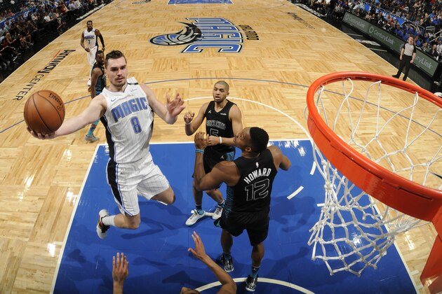 ORLANDO, FL - FEBRUARY 14: Mario Hezonja #8 of the Orlando Magic shoots the ball against the Charlotte Hornets on February 14, 2018 at Amway Center in Orlando, Florida. NOTE TO USER: User expressly acknowledges and agrees that, by downloading and or using this photograph, User is consenting to the terms and conditions of the Getty Images License Agreement. Mandatory Copyright Notice: Copyright 2018 NBAE (Photo by Fernando Medina/NBAE via Getty Images)