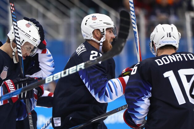 GANGNEUNG, SOUTH KOREA - FEBRUARY 16: Troy Terry #23 of the United States, James Wisniewski #21 of the United States and Ryan Donato #16 of the United States celebrate after Donato scores in the third period against Slovakia during the Men's Ice Hockey Preliminary Round Group B game at Gangneung Hockey Centre on February 16, 2018 in Gangneung, South Korea.  (Photo by Jamie Squire/Getty Images)