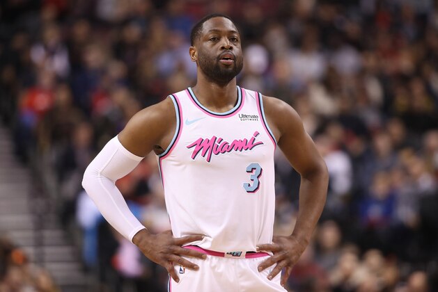 TORONTO, ON - FEBRUARY 13: Dwyane Wade #3 of the Miami Heat looks on against the Toronto Raptors at Air Canada Centre on February 13, 2018 in Toronto, Canada. NOTE TO USER: User expressly acknowledges and agrees that, by downloading and or using this photograph, User is consenting to the terms and conditions of the Getty Images License Agreement. (Photo by Tom Szczerbowski/Getty Images)