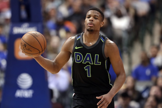 Dallas Mavericks' Dennis Smith Jr. (1) handles the ball during an NBA basketball game against the Sacramento Kings on Tuesday, Feb. 13, 2018, in Dallas. (AP Photo/Tony Gutierrez)