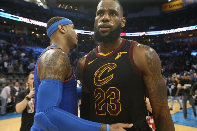 OKLAHOMA CITY, OK - FEBRUARY 13:  LeBron James #23 of the Cleveland Cavaliers and Carmelo Anthony #7 of the Oklahoma City Thunder hug after the game on February 13, 2018 at Chesapeake Energy Arena in Oklahoma City, Oklahoma. NOTE TO USER: User expressly acknowledges and agrees that, by downloading and or using this photograph, User is consenting to the terms and conditions of the Getty Images License Agreement. Mandatory Copyright Notice: Copyright 2018 NBAE (Photo by Layne Murdoch/NBAE via Getty Images)