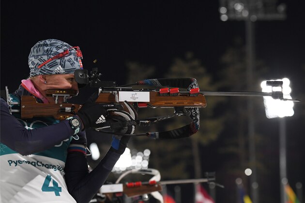 Slovakia's Anastasiya Kuzmina competes at the shooting range during the women's 12,5km mass start biathlon event during the Pyeongchang 2018 Winter Olympic Games on February 17, 2018, in Pyeongchang. / AFP PHOTO / Kirill KUDRYAVTSEV        (Photo credit should read KIRILL KUDRYAVTSEV/AFP/Getty Images)