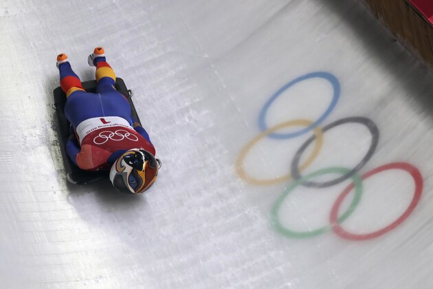 Maria Marinela Mazilu of Romania takes a curve on her third run during the women's skeleton competition at the 2018 Winter Olympics in Pyeongchang, South Korea, Saturday, Feb. 17, 2018. (AP Photo/Michael Sohn)