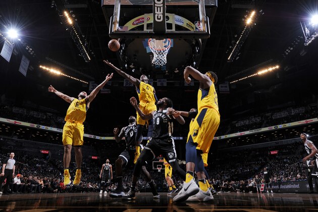 BROOKLYN, NY - FEBRUARY 14: Victor Oladipo #4 of the Indiana Pacers rebounds the ball during the game against the Brooklyn Nets on February 14, 2018 at Barclays Center in Brooklyn, New York. NOTE TO USER: User expressly acknowledges and agrees that, by downloading and or using this Photograph, user is consenting to the terms and conditions of the Getty Images License Agreement. Mandatory Copyright Notice: Copyright 2018 NBAE (Photo by Matteo Marchi/NBAE via Getty Images)