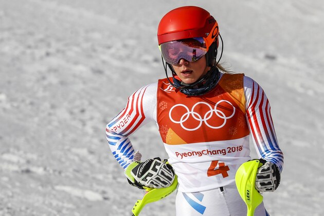 Mikaela Shiffrin, of the United States, rests in the finish area after the first run of the Women's Slalom at the 2018 Winter Olympics in Pyeongchang, South Korea, Friday, Feb. 16, 2018. (AP Photo/Morry Gash)