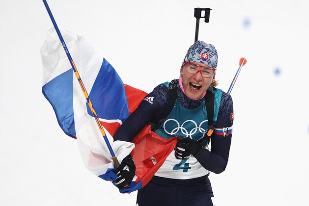 PYEONGCHANG-GUN, SOUTH KOREA - FEBRUARY 17:  Anastasiya Kuzmina of Slovakia celebrates winning the gold medal during the Women's 12.5km Mass Start Biathlon on day eight of the PyeongChang 2018 Winter Olympic Games at Alpensia Biathlon Centre on February 17, 2018 in Pyeongchang-gun, South Korea.  (Photo by Adam Pretty/Getty Images)