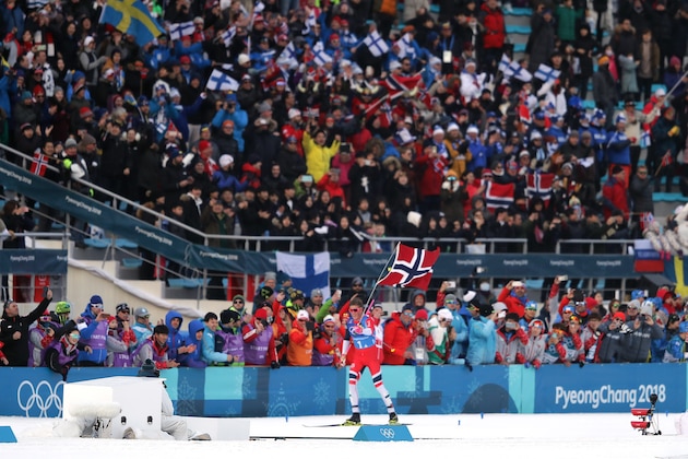 PYEONGCHANG-GUN, SOUTH KOREA - FEBRUARY 18:  Johannes Hoesflot Klaebo of Norway celebrates on his way to winning the gold medal during Cross-Country Skiing men's 4x10km relay on day nine of the PyeongChang 2018 Winter Olympic Games at Alpensia Cross-Country Center on February 18, 2018 in Pyeongchang-gun, South Korea.  (Photo by Richard Heathcote/Getty Images)