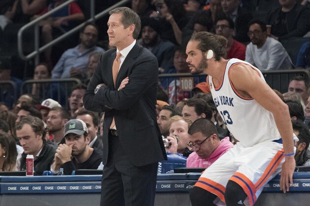 New York Knicks head coach Jeff Hornacek and center Joakim Noah watch the game action during the first half of an NBA basketball game Houston Rockets, Wednesday, Nov. 2, 2016, at Madison Square Garden in New York. The Rockets won 118-99. (AP Photo/Mary Altaffer)